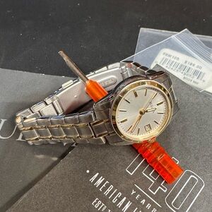 Woman’s Bulova 98M105 2015 Silver and Gold Watch